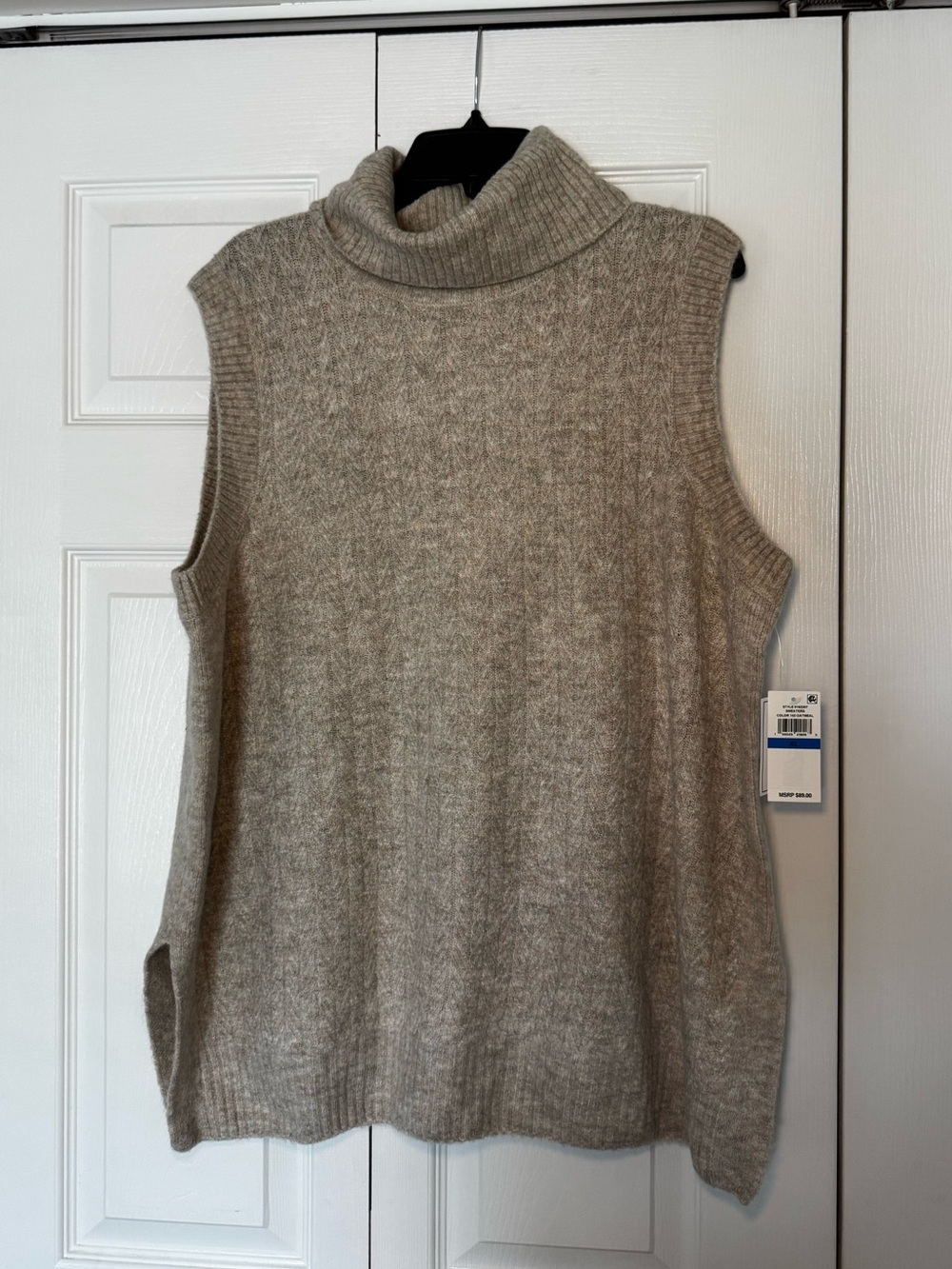 One State turtle neck sweater vest.